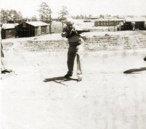 Charles E Williams Jr with rifle